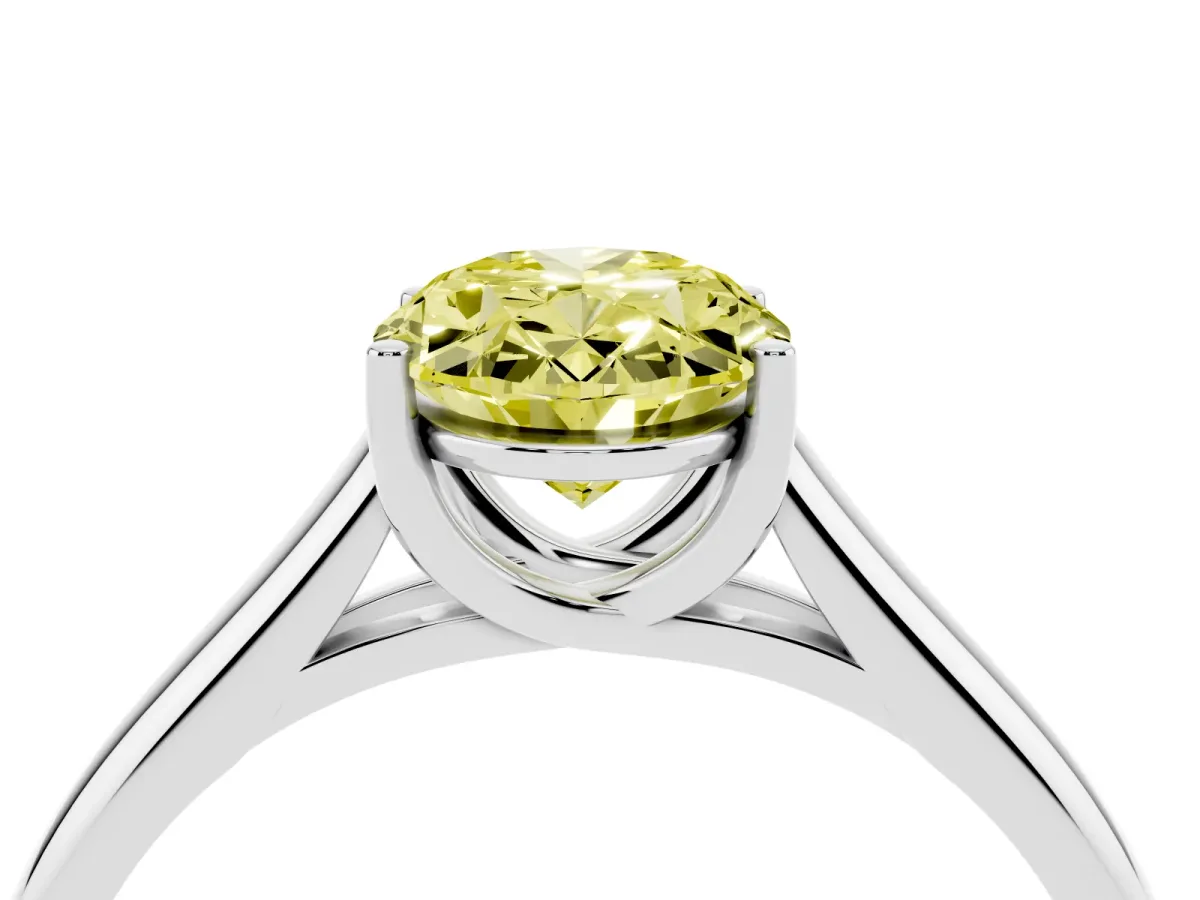 Fancy Yellow Oval Cut Solitaire Engagement Ring with Tapered Band and Four-Prong Setting Platinum