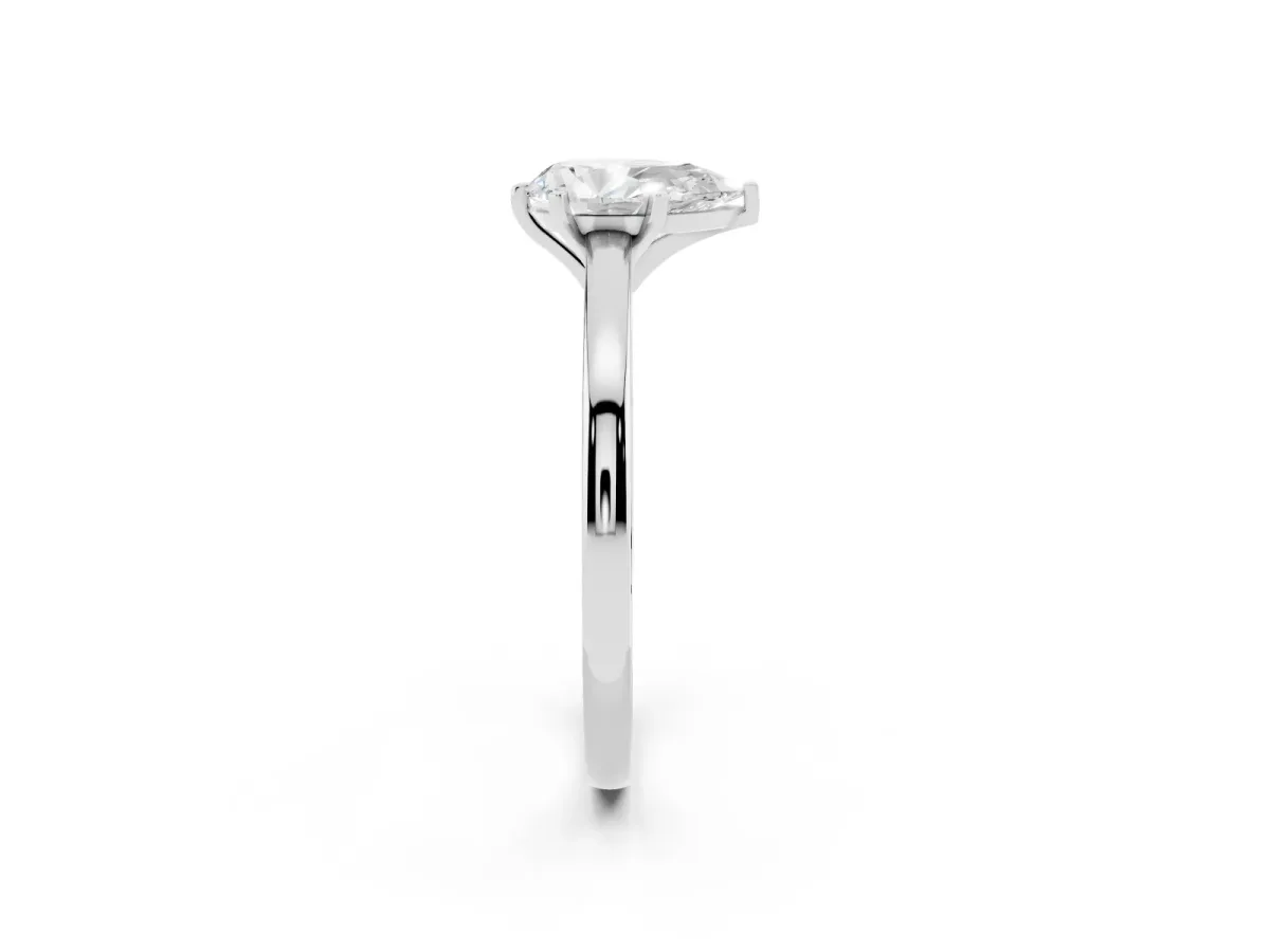 Pear Cut Solitaire Diamond Engagement Ring with Four-Prong Setting on a Classic Band White gold