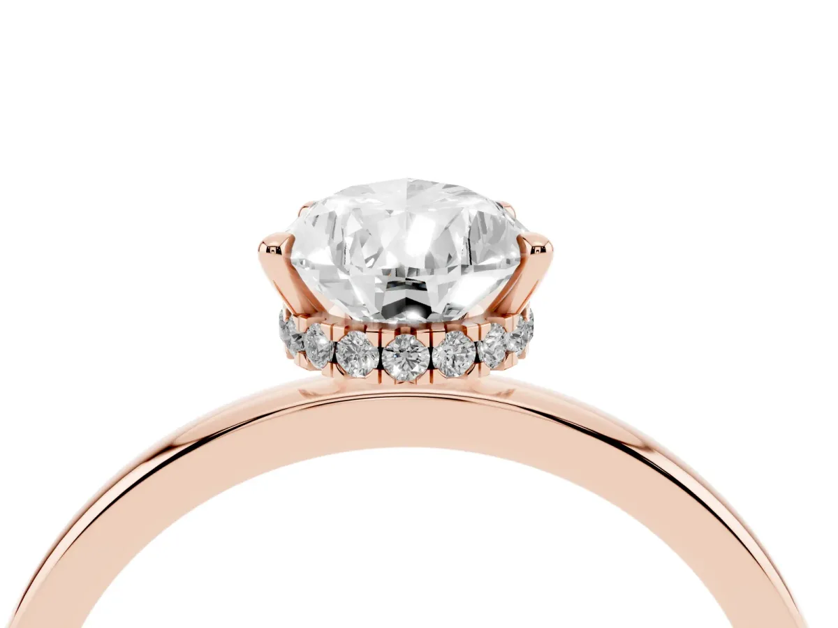 Pear Cut Solitaire Engagement Ring with Cathedral Band and Four-Prong Setting Rose gold