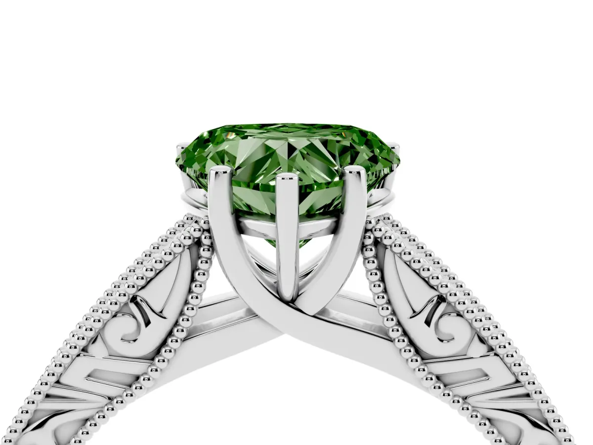 Fancy Green Heart Cut Diamond Solitaire Ring with Engraved Band and Four-Prong Setting Silver