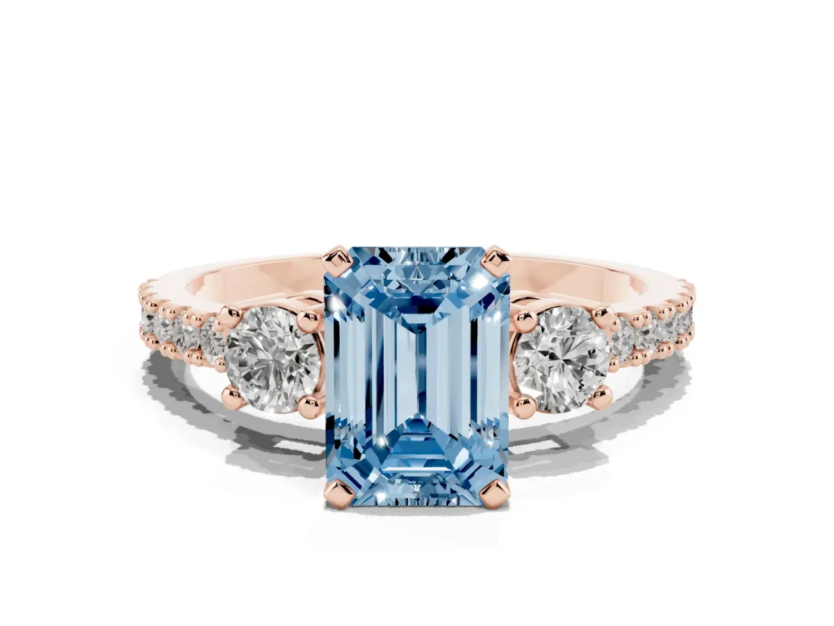 Fancy Blue Emerald Cut Three-Stone Diamond Pavé Band with Prong Setting Rose gold