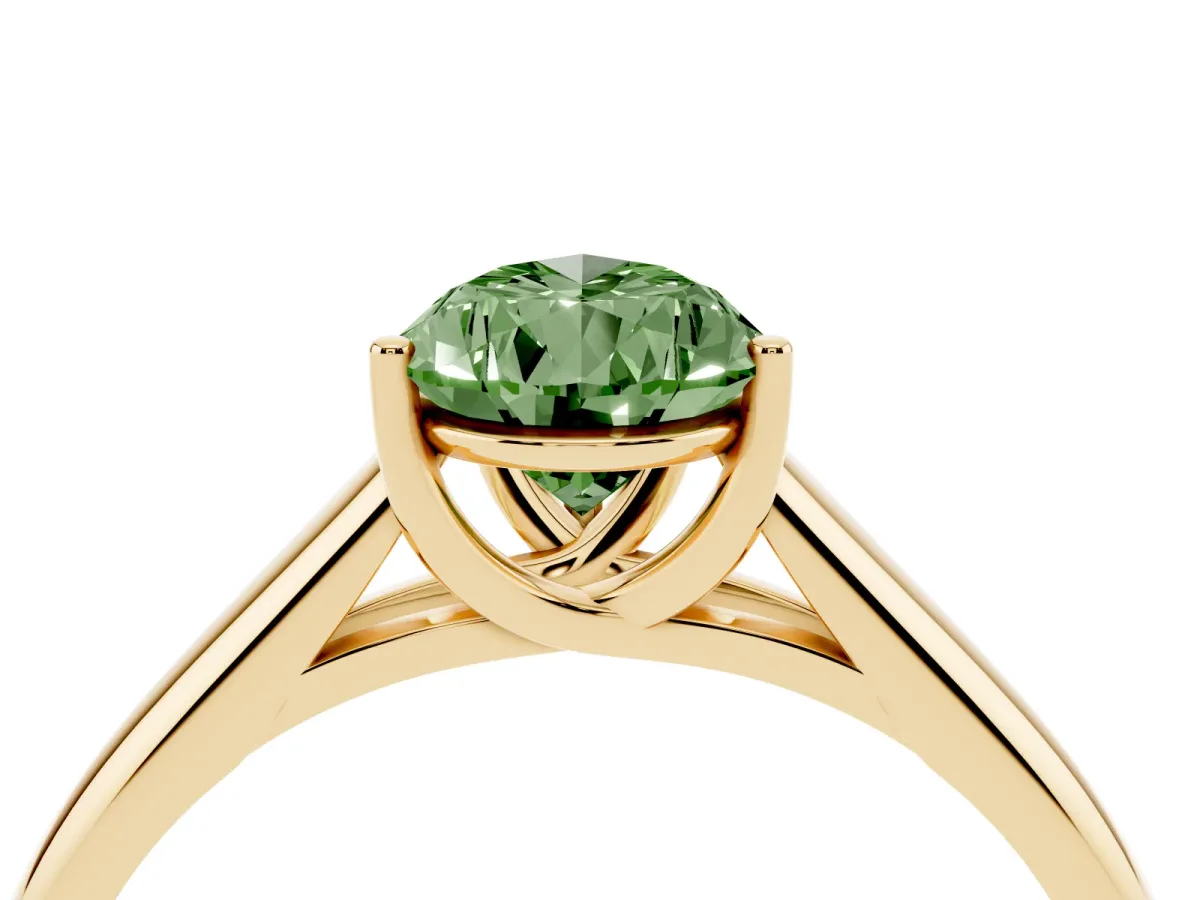 Fancy Green Pear Cut Solitaire Engagement Ring with Tapered Band and Four-Prong Setting Yellow gold