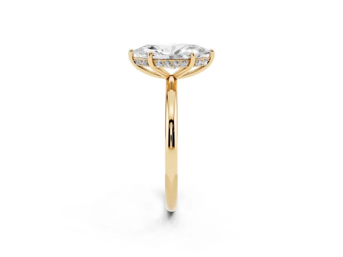 Marquise Cut Solitaire Diamond Ring with a Classic Band and Four-Prong Setting Yellow gold