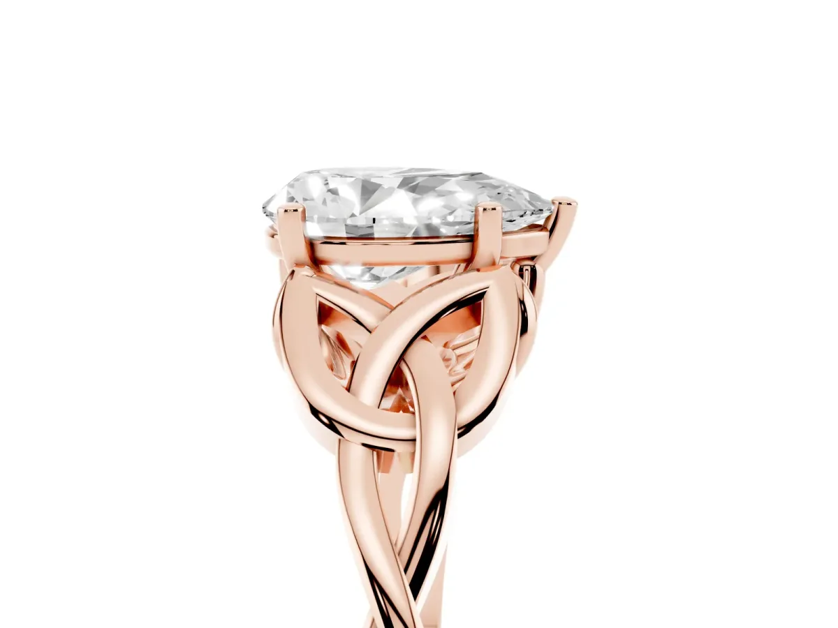 Pear Cut Diamond Solitaire Engagement Ring with Celtic Knot Band and Four-Prong Setting Rose gold