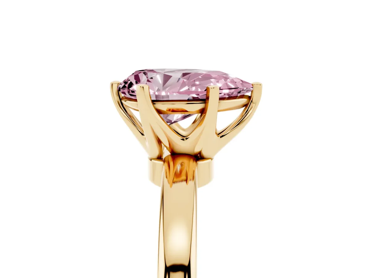 Fancy Pink Pear Cut Solitaire Diamond Ring with Six-Prong Setting on a Classic Band Yellow gold