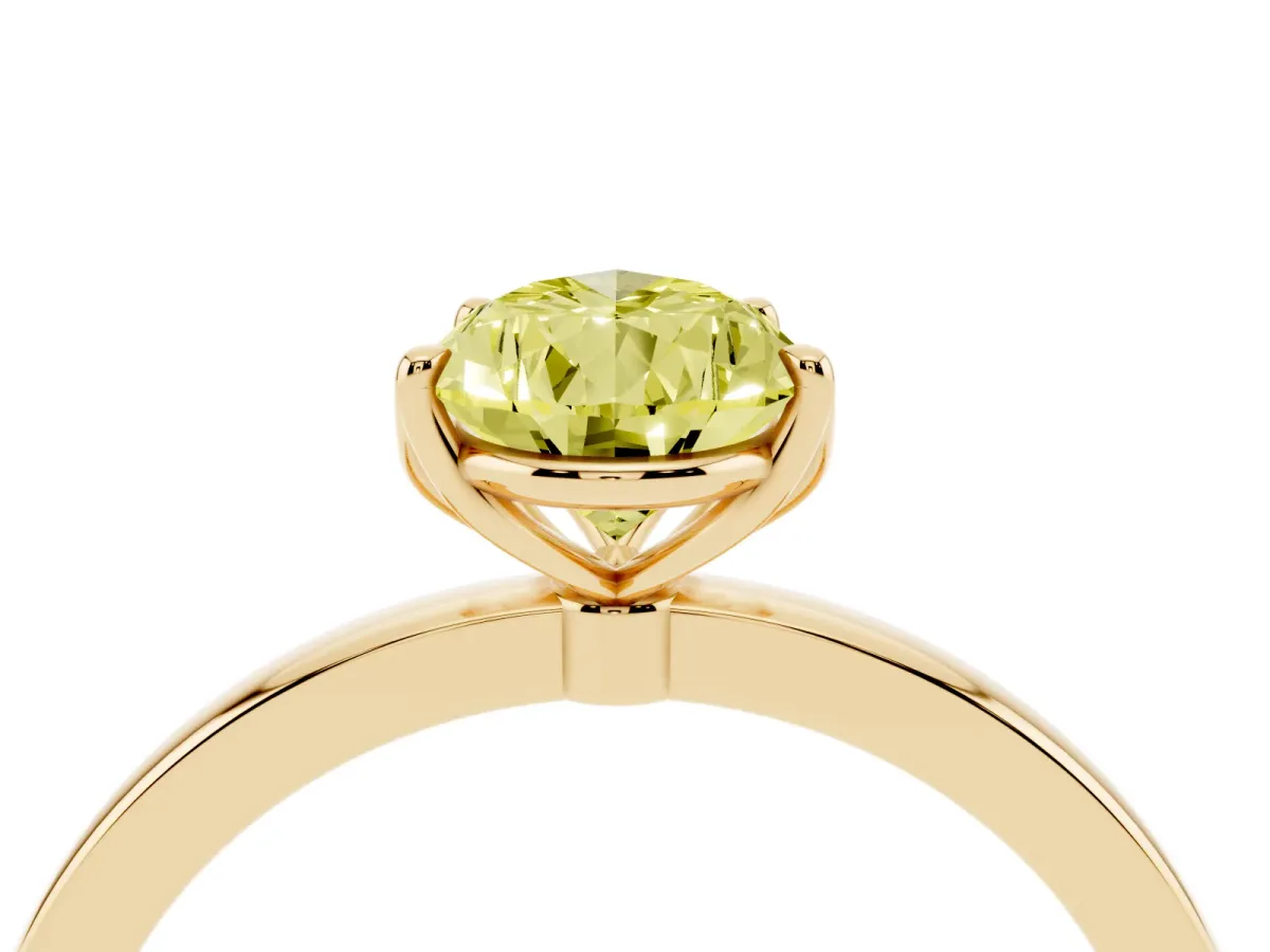 Fancy Yellow Pear Cut Diamond Solitaire Ring with Thin Band and Prong Setting Yellow gold