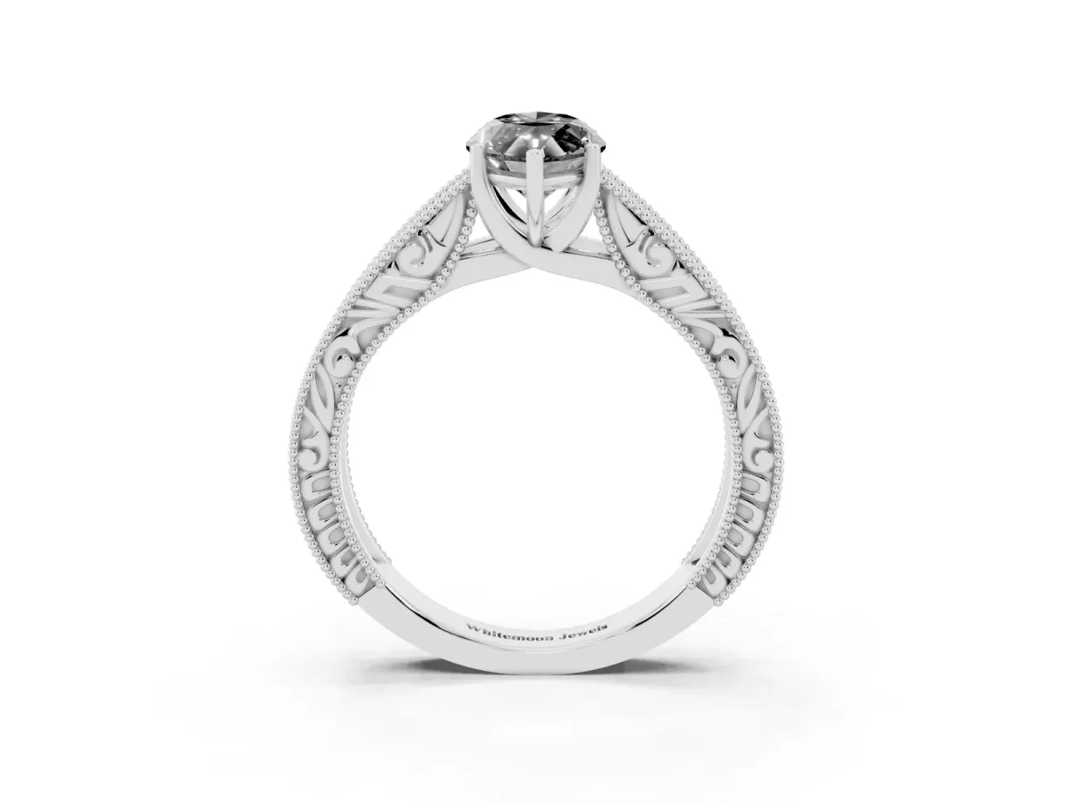Fancy Black Marquise Cut Diamond Solitaire Ring with Engraved Band and Four-Prong Setting Silver