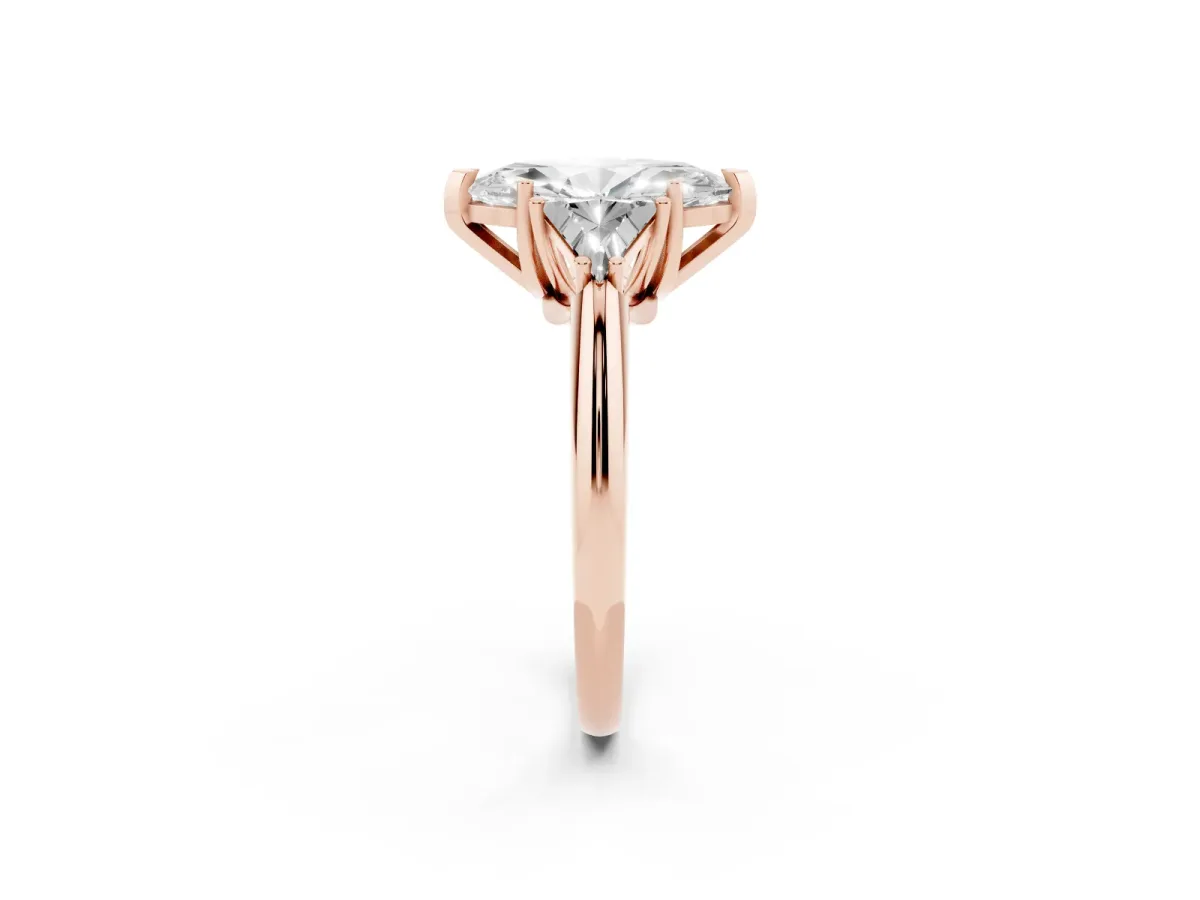 Three-Stone Marquise Cut Diamond Engagement Ring with Trillion Side Stones and Prong Setting Rose gold