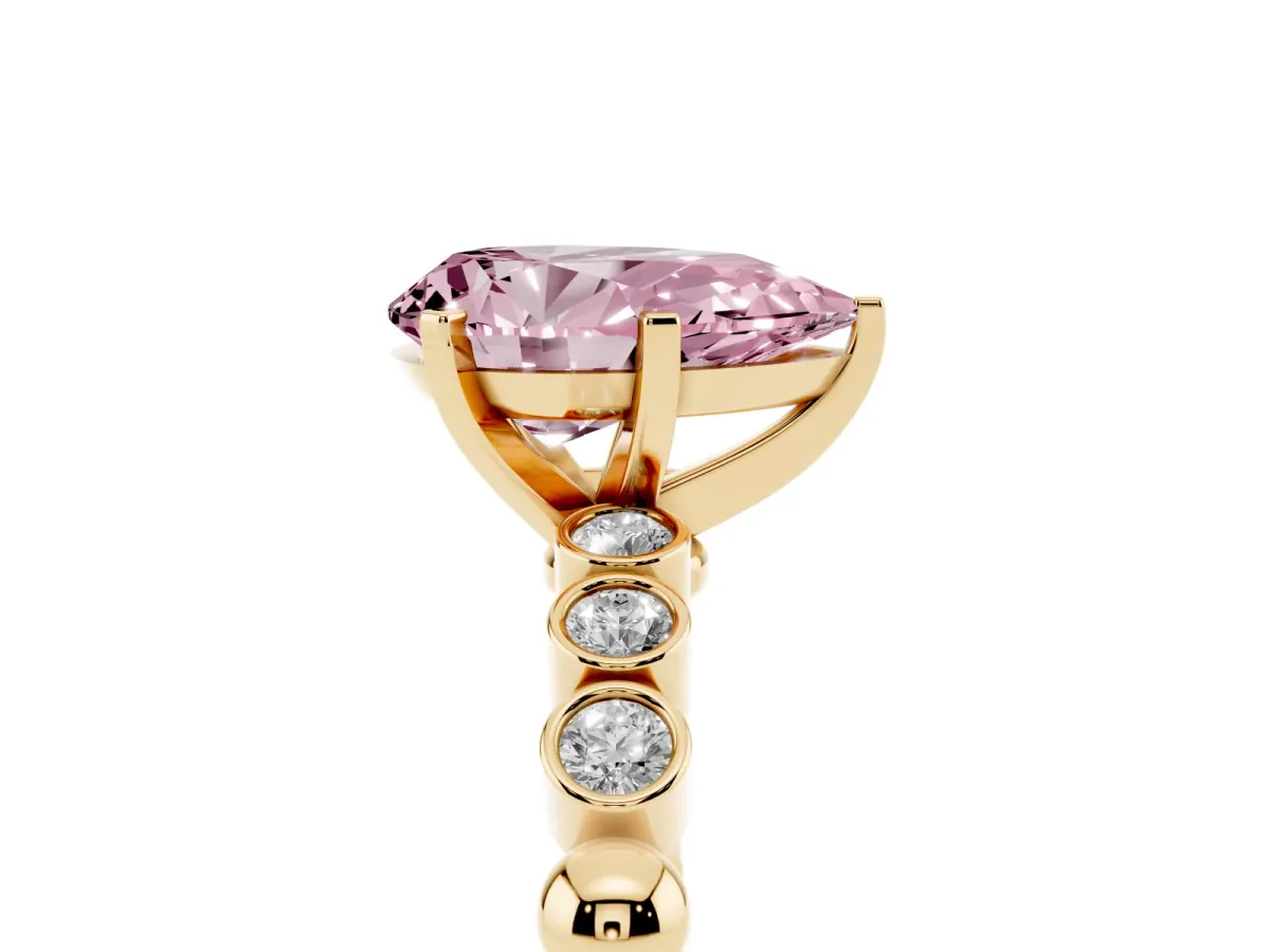 Fancy Pink Pear Cut Solitaire Bezel Accent Diamond Engagement Ring with Beaded Band and Four-Prong Setting Yellow gold