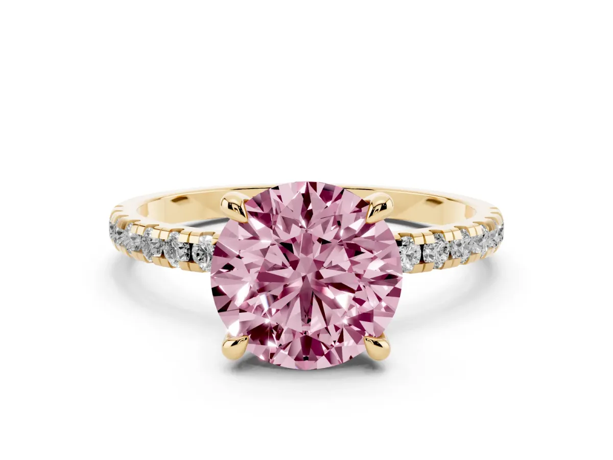 Fancy Pink Round Cut Diamond Brilliant Solitaire Ring with Pavé Band and Four-Prong Setting Yellow gold