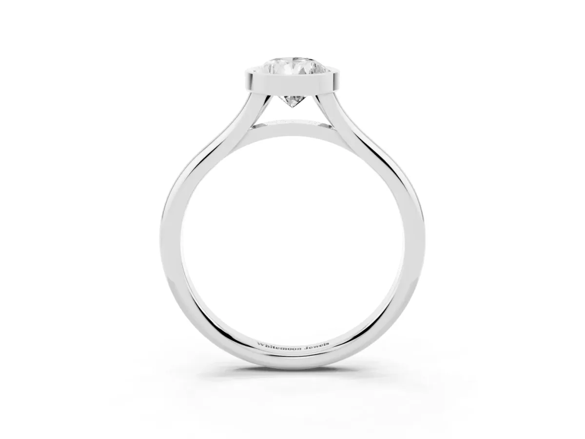 Bezel Set Pear Cut Cut Solitaire Ring with Tapered Band Platinum