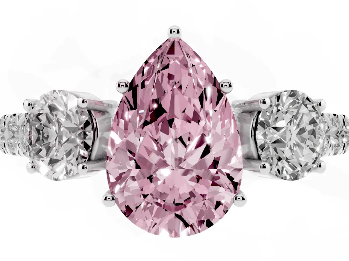 Fancy Pink Pear Cut Cut Diamond Three-Stone Ring with Round Side Stones and Pavé Band Platinum