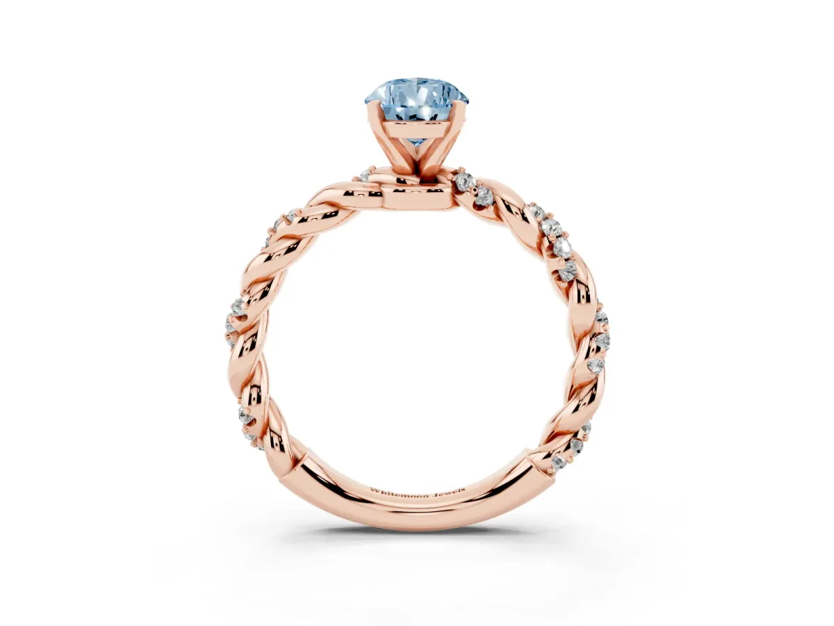 Fancy Blue Pear Cut Diamond Solitaire Ring with Twisted Band and Pavé Accents Rose gold