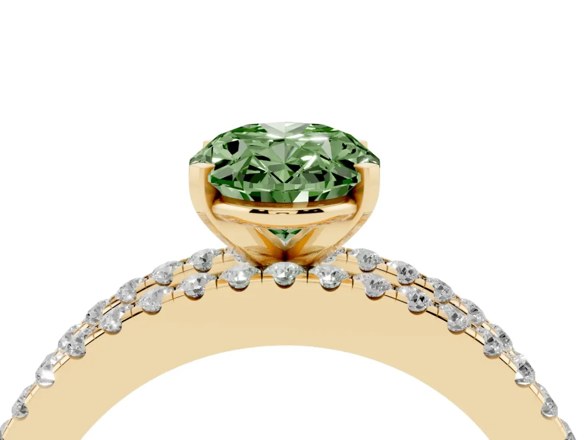 Fancy Green Oval Cut Diamond Solitaire Ring with Pavé and Channel Set Band Yellow gold