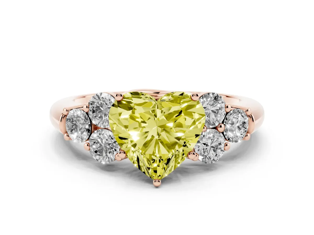 Fancy Yellow Heart Cut Cut Diamond Cluster Ring with Round Accent Stones and Prong Setting on a Classic Band Rose gold
