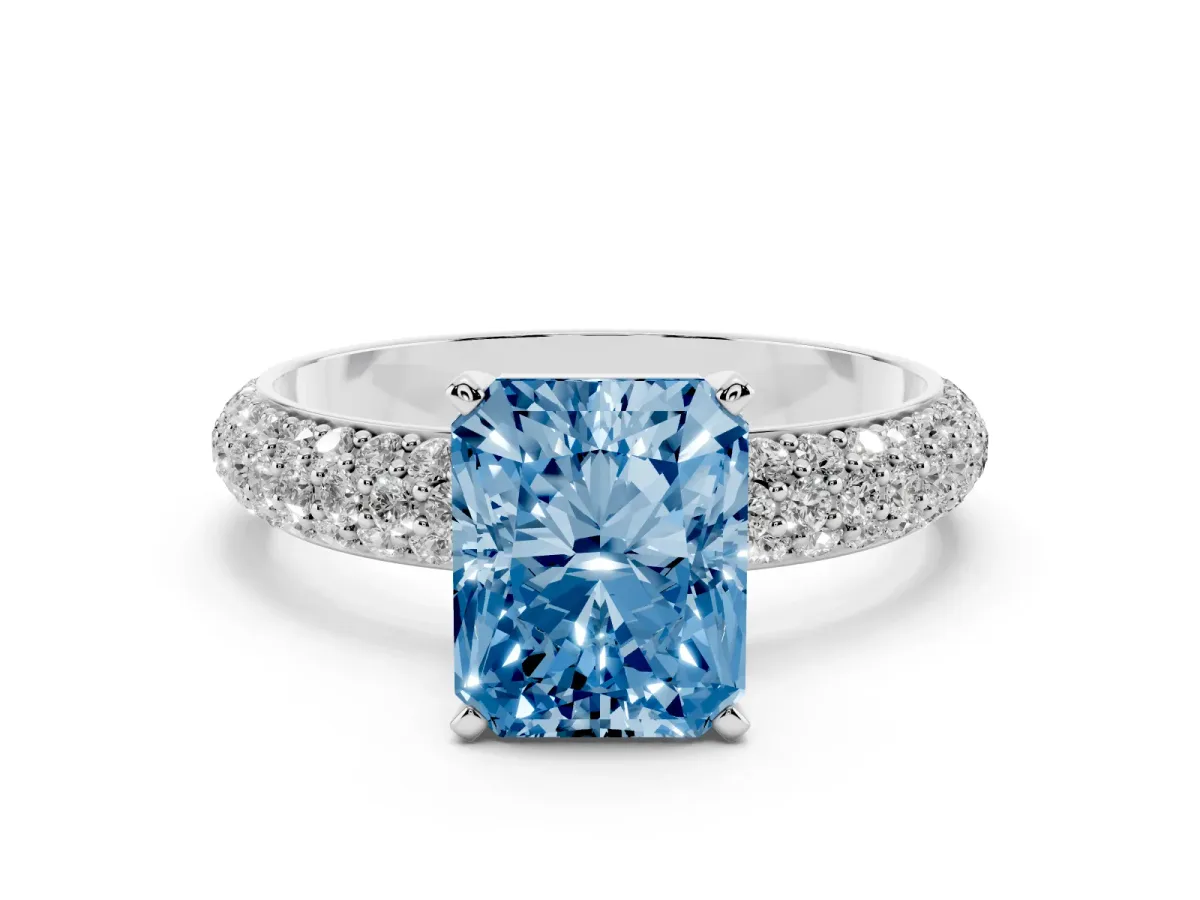 Fancy Blue Radiant Cut Diamond Solitaire Ring with Prong Setting and Pavé Band Silver