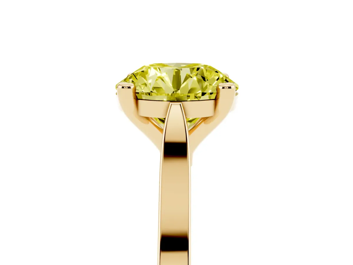 Fancy Yellow Round Cut Solitaire Diamond Ring with Four-Prong Setting and Tapered Band Yellow gold
