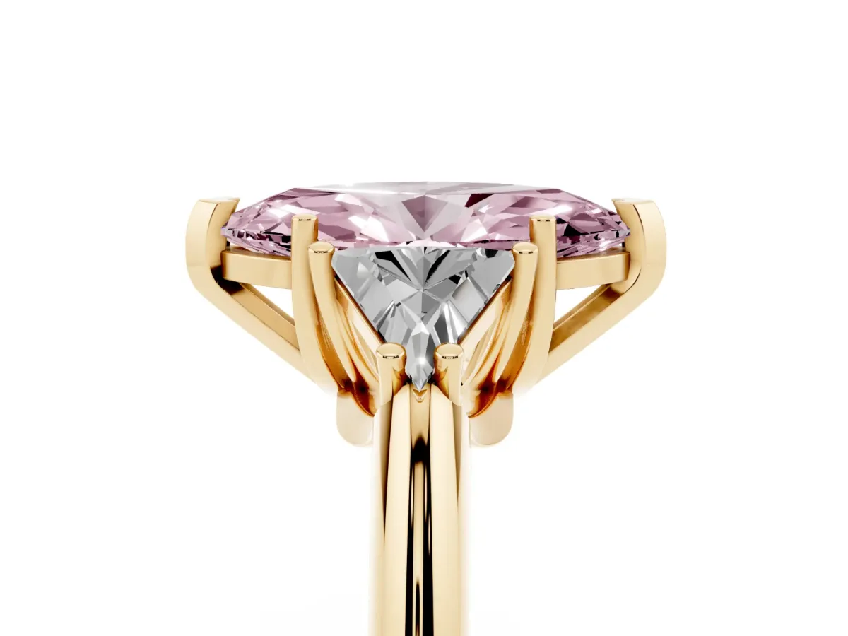 Fancy Pink Three-Stone Marquise Cut Diamond Engagement Ring with Trillion Side Stones and Prong Setting Yellow gold