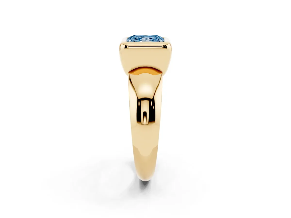 Fancy Blue Bezel Set Princess Cut Solitaire Ring with Wide Band Yellow gold