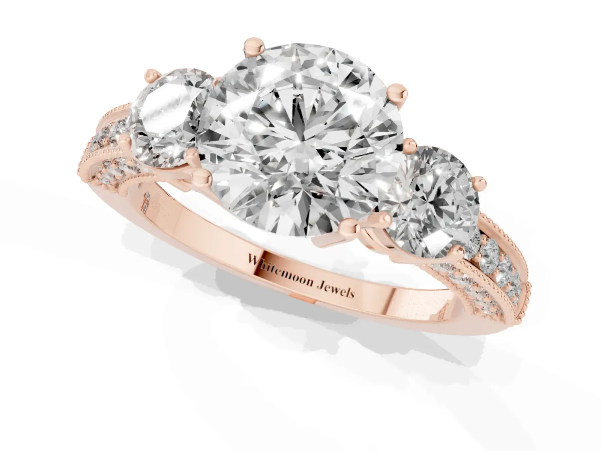 Round Cut Three-Stone Diamond Ring with Pavé Band and Four-Prong Setting Rose gold