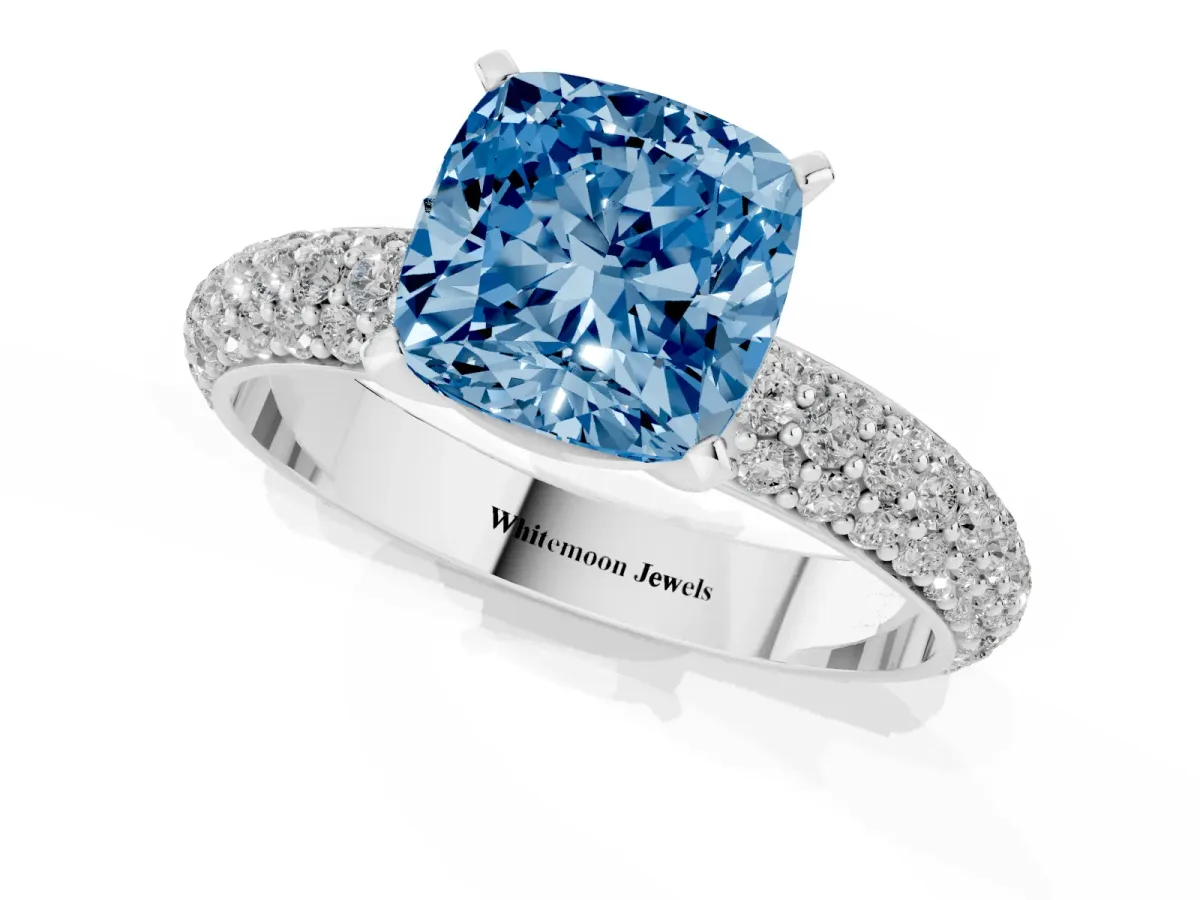 Fancy Blue Cushion Cut Diamond Solitaire Ring with Prong Setting and Pavé Band Silver