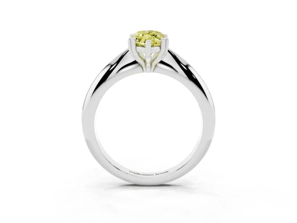 Fancy Yellow Marquise Cut Cut Solitaire Engagement Ring with Tapered Band and Four-Prong Setting White gold