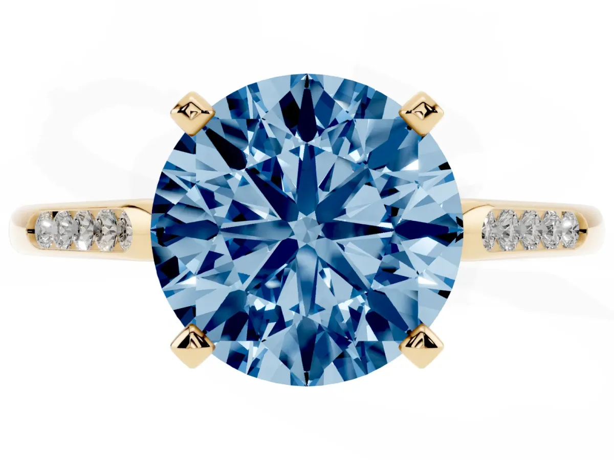 Fancy Blue Round Cut Diamond Solitaire Ring with Channel Set Round Band and Prong Setting Yellow gold