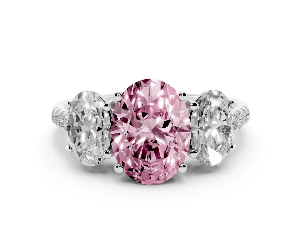 Fancy Pink Three-Stone Oval Cut Diamond Ring with Round Pavé Band and Prong Setting Silver