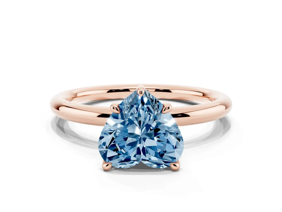Fancy Blue Heart Cut Diamond Solitaire Ring with Thin Band and Four-Prong Setting Rose gold