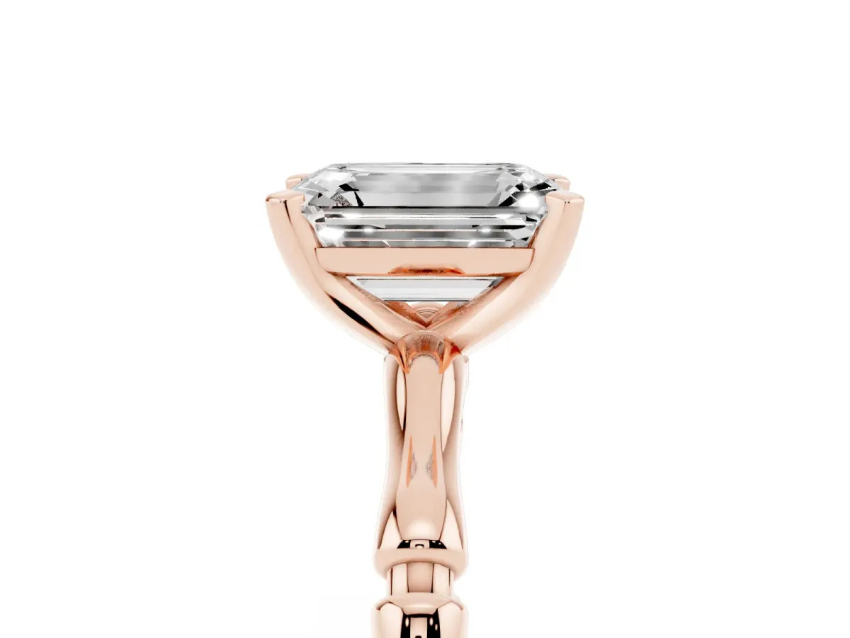 Emerald Cut Solitaire Diamond Ring with Bamboo Band and Four-Prong Setting Rose gold