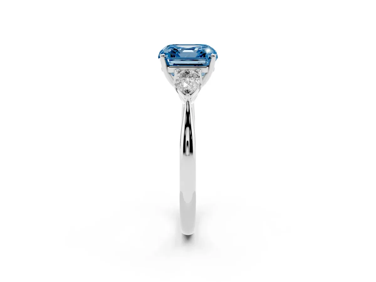 Fancy Blue Asscher Cut Diamond Three-Stone Ring with Pear Side Stones and Prong Setting Platinum