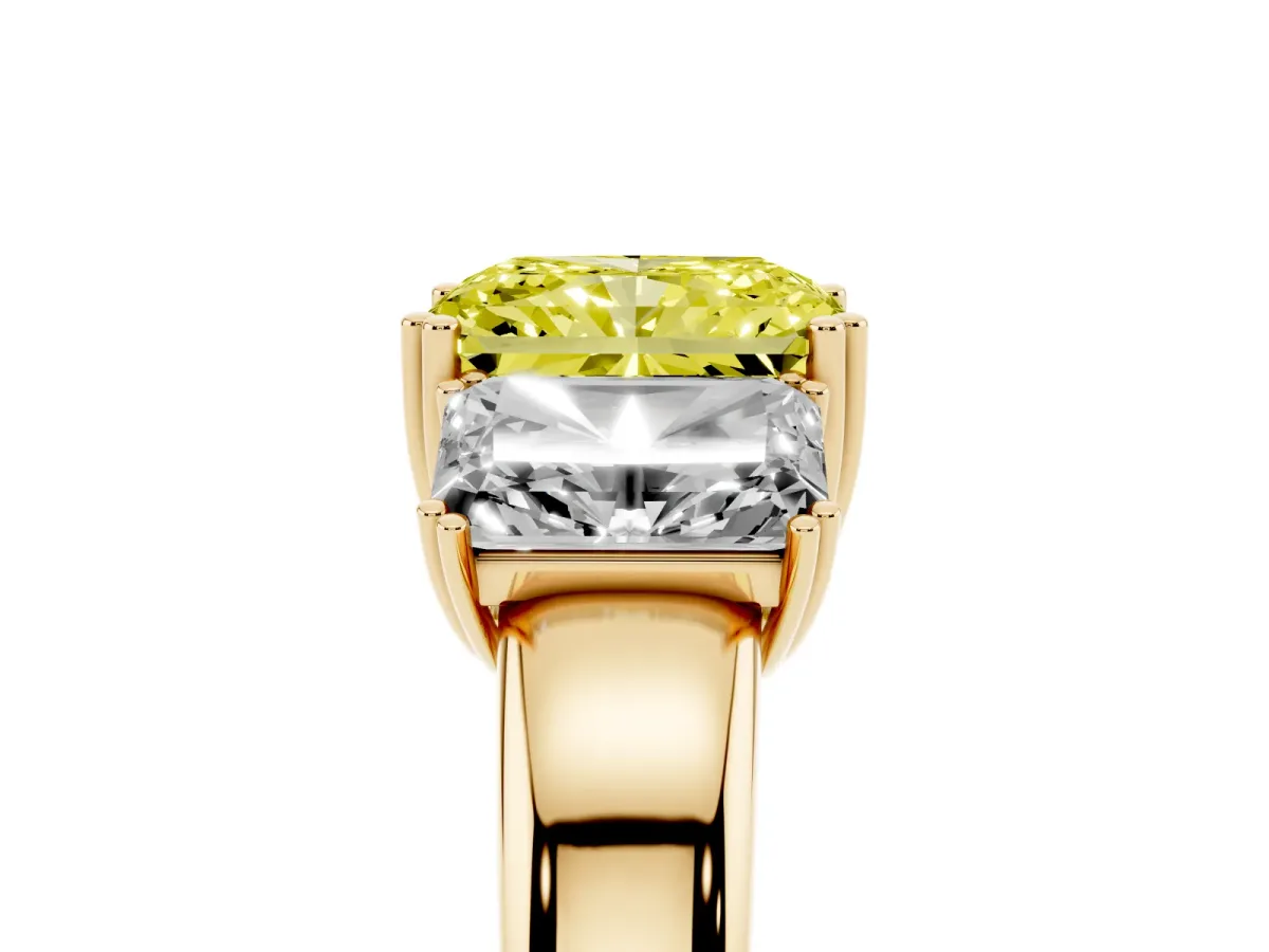 Fancy Yellow Three-Stone Radiant Cut Cut Diamond Ring with Channel Set Band and Four-Prong Setting Yellow gold