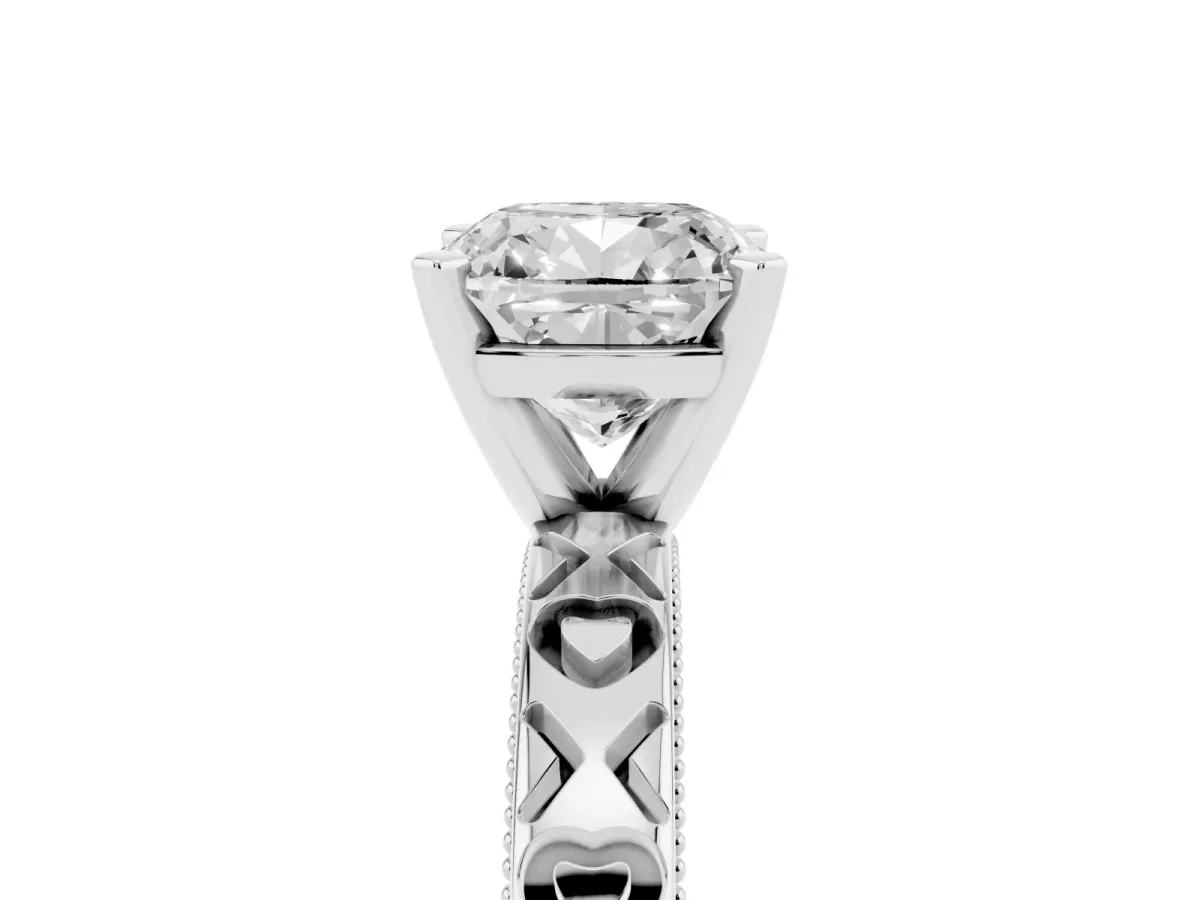 Cushion Cut Solitaire Diamond Engagement Ring with XO Engraved Band and Four-Prong Setting Platinum