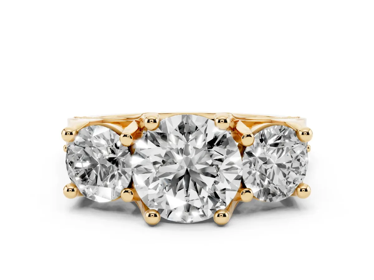 Round Cut Diamond Three-Stone Ring with Channel Set Band and Four-Prong Setting Yellow gold