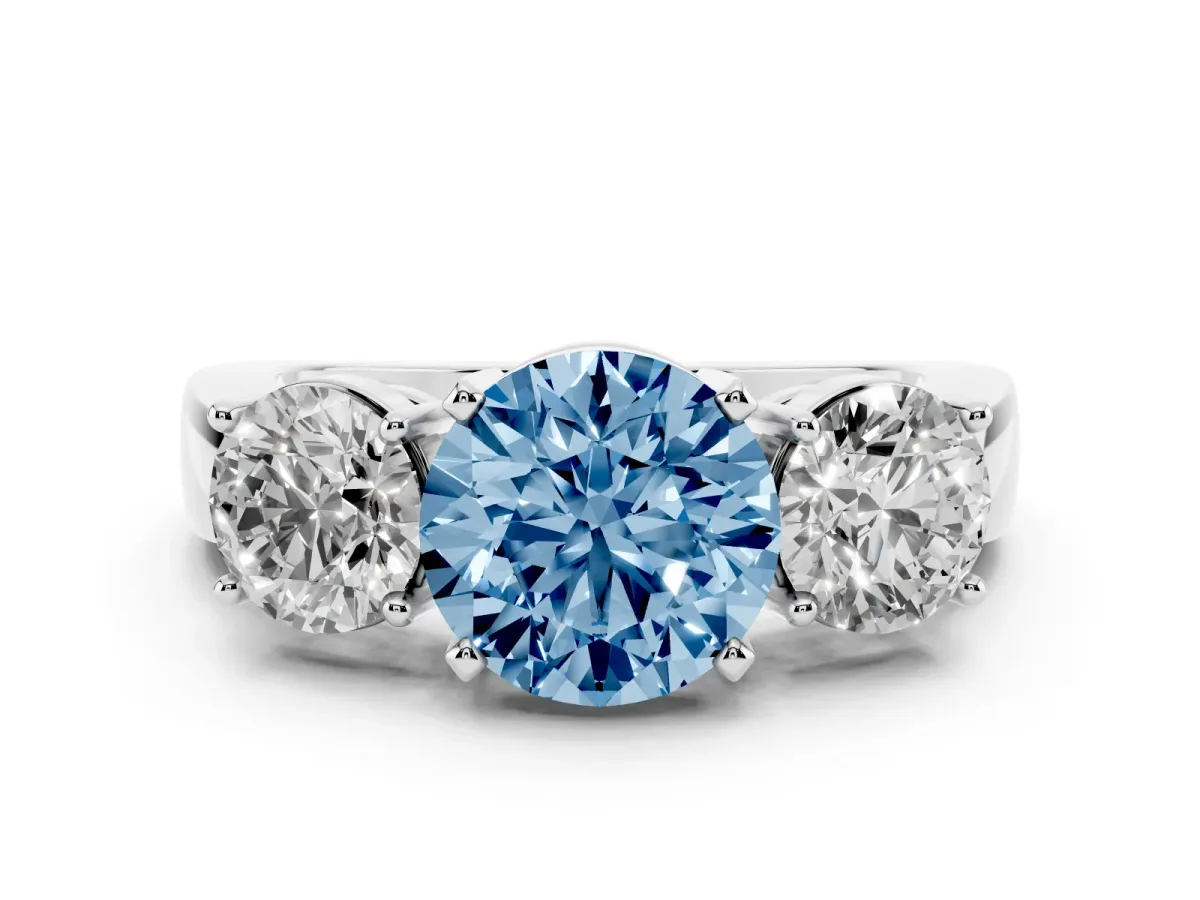 Fancy Blue Three-Stone Round Cut Diamond Ring with Round Side Stones, Classic Band, and Four-Prong Setting White gold