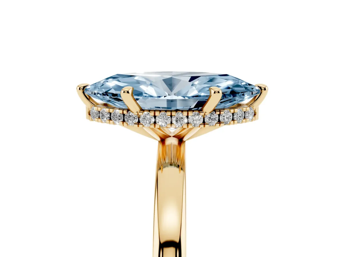 Fancy Blue Marquise Cut Solitaire Engagement Ring with Cathedral Band and Four-Prong Setting Yellow gold