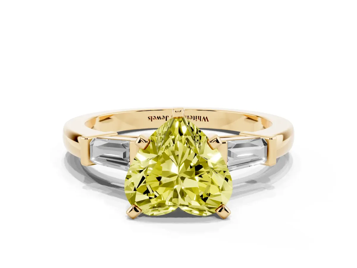 Fancy Yellow Heart Cut Cut Diamond Solitaire Ring with Tapered Baguette Accents and Four-Prong Setting Yellow gold