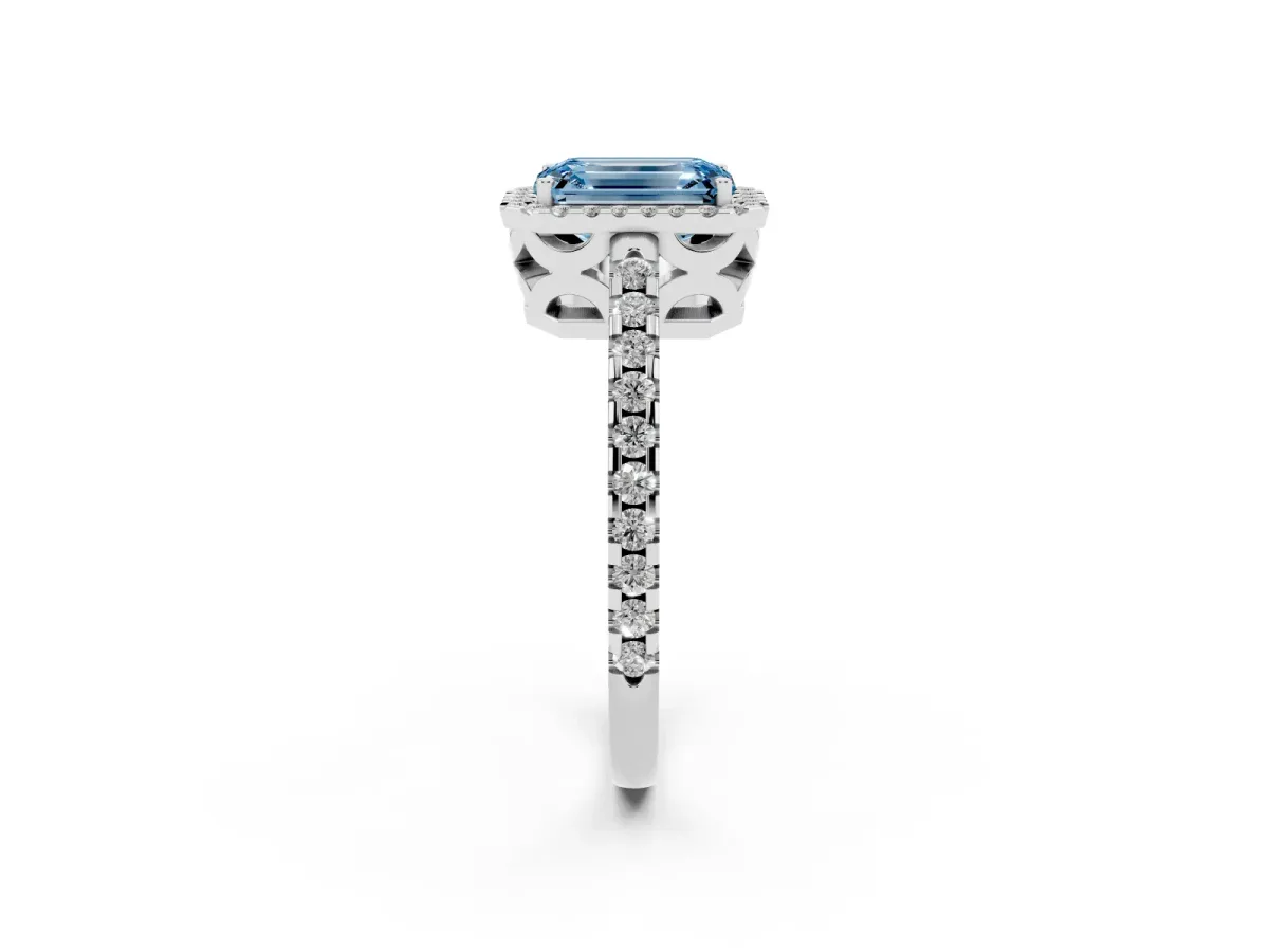 Fancy Blue Emerald Cut Diamond Halo Engagement Ring with Pavé Band and Prong Setting White gold