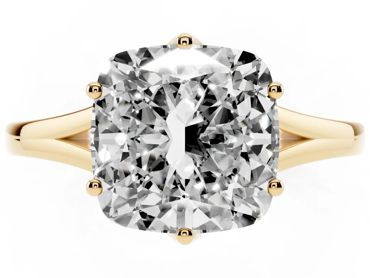 Cushion Cut Solitaire Diamond Ring with Six-Prong Setting and Tapered Band Yellow gold