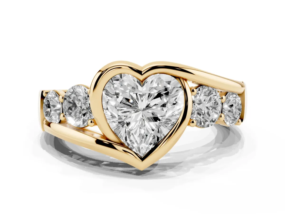 Bezel Set Heart Cut Diamond Bypass Ring with Round Accents Yellow gold