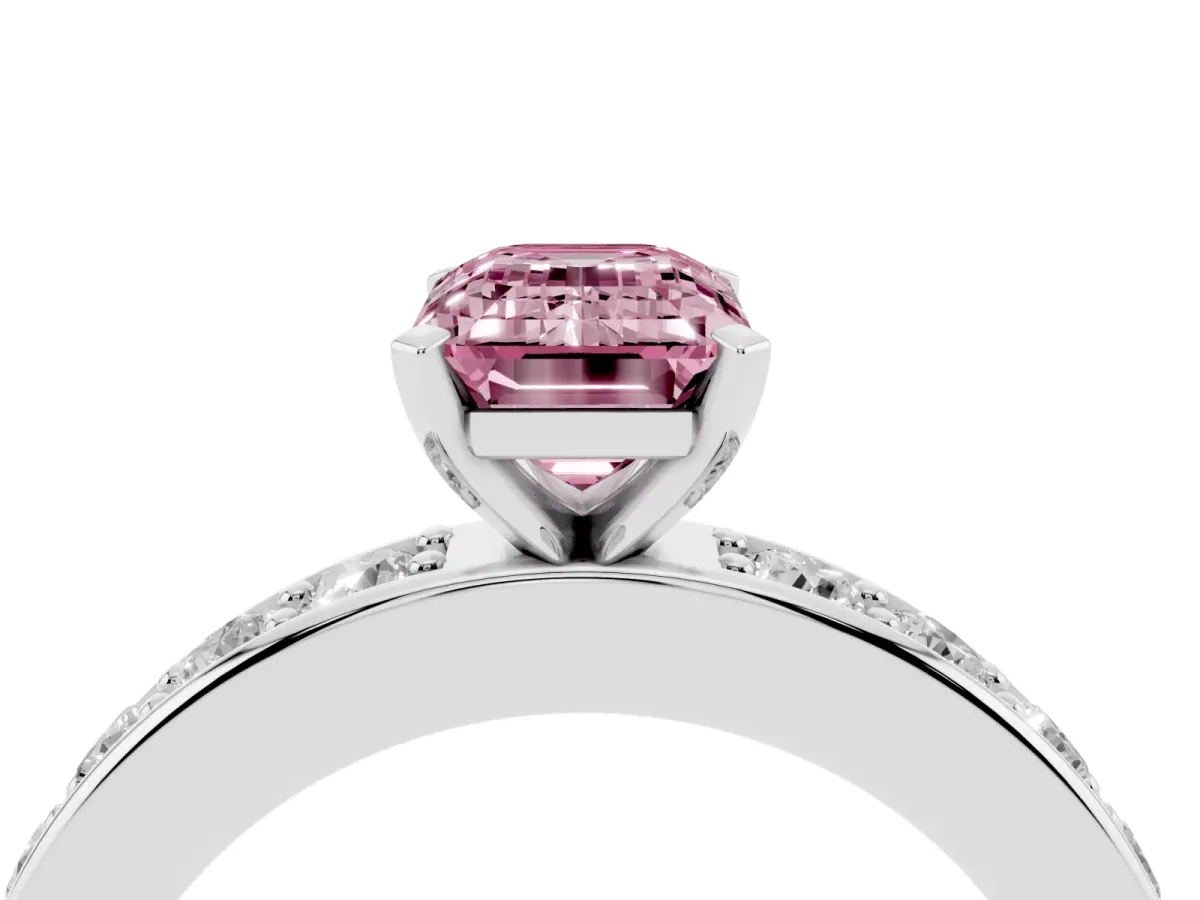 Fancy Pink Emerald Cut Diamond Engagement Ring with Channel Set Round Band and Prong Setting Platinum