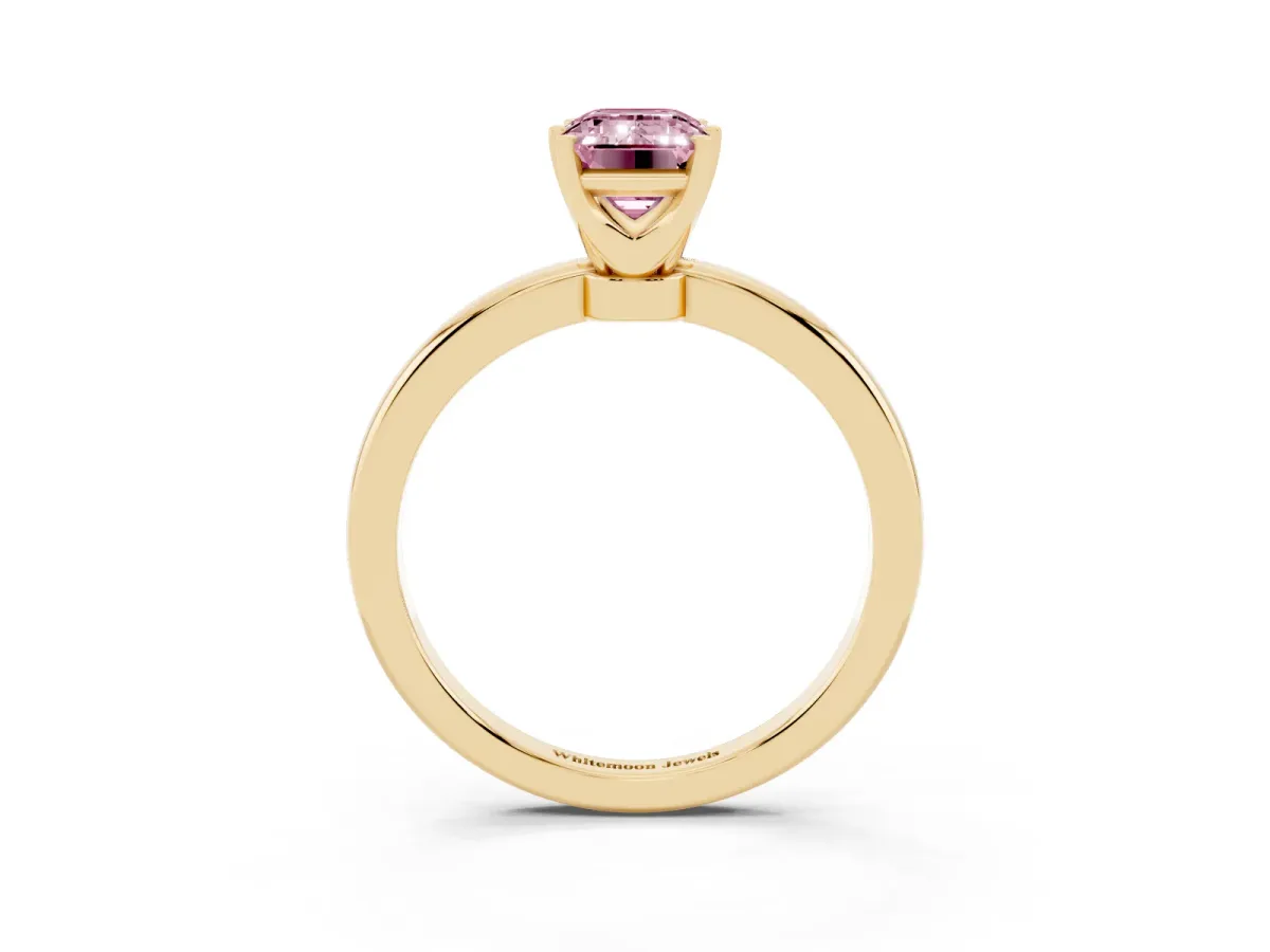 Fancy Pink Emerald Cut Solitaire Diamond Ring with Six-Prong Setting on a Classic Band Yellow gold