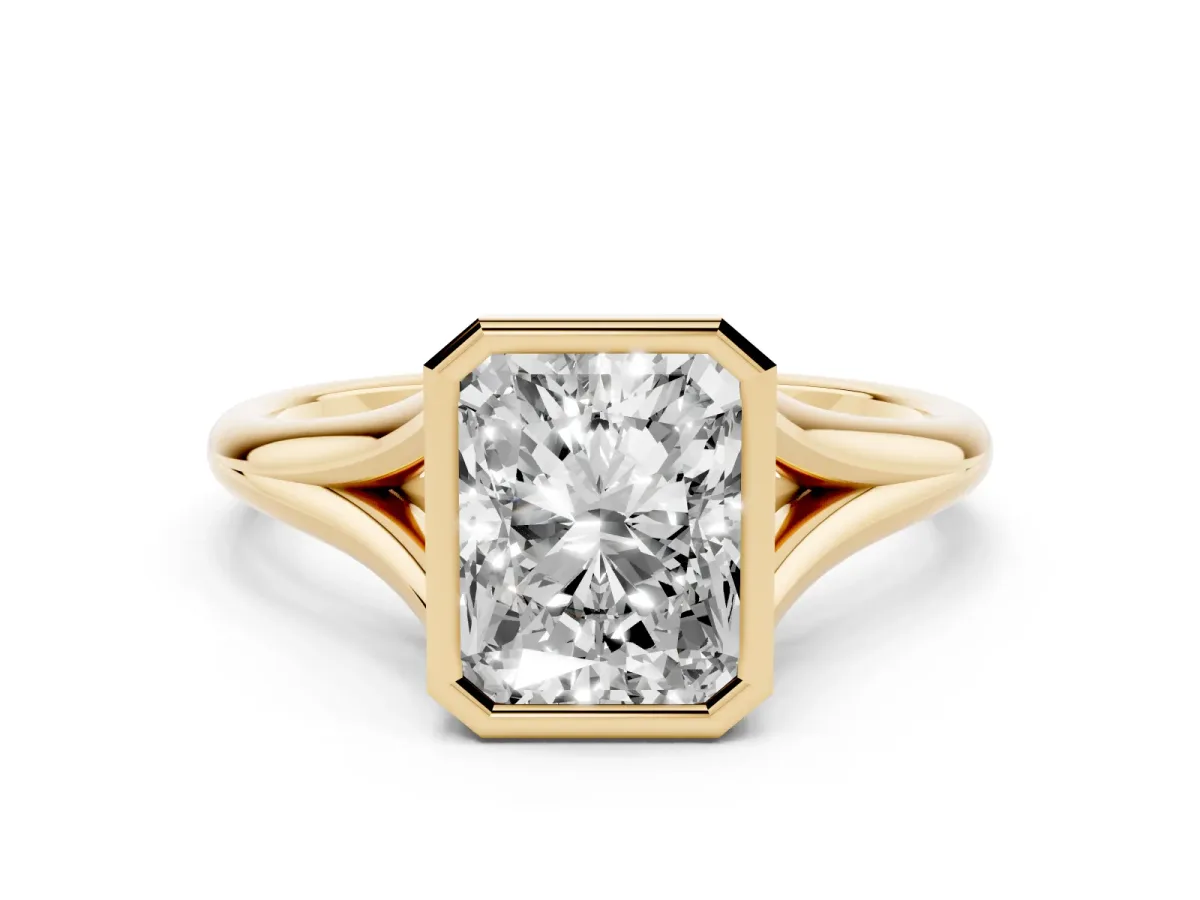 Bezel Set Radiant Cut Cut Solitaire Ring with Tapered Band Yellow gold