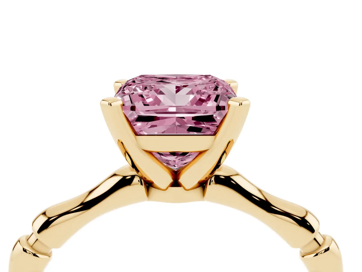 Fancy Pink Princess Cut Solitaire Diamond Ring with Bamboo Band and Four-Prong Setting Yellow gold