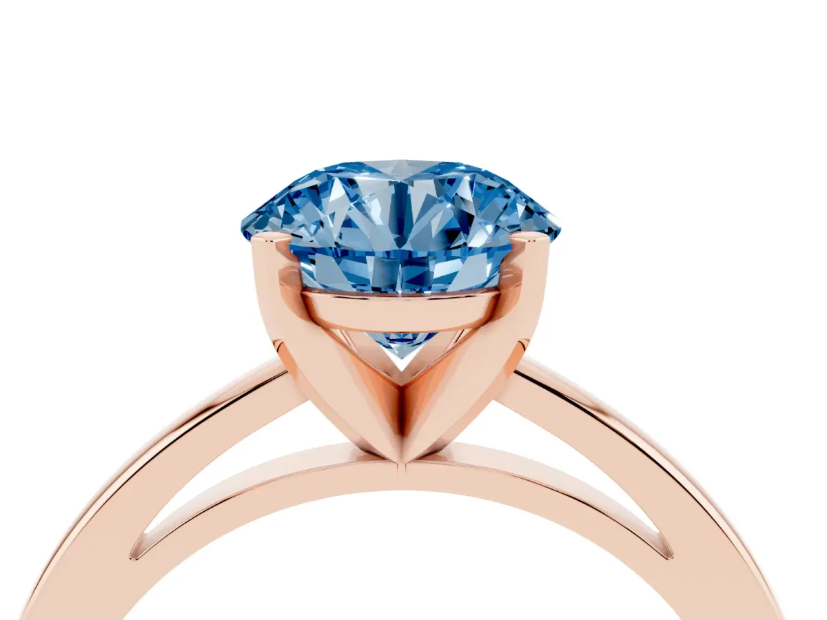 Fancy Blue Round Cut Solitaire Diamond Engagement Ring with Four-Prong Setting on a Classic Band Rose gold