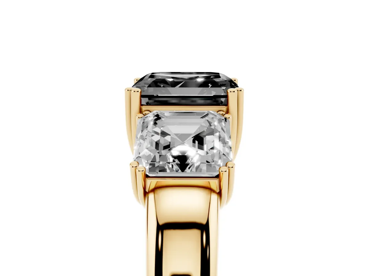 Fancy Black Three-Stone Asscher Cut Cut Diamond Ring with Channel Set Band and Four-Prong Setting Yellow gold