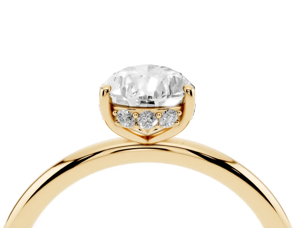 Pear Cut Solitaire Diamond Ring with a Classic Band and Four-Prong Setting Yellow gold