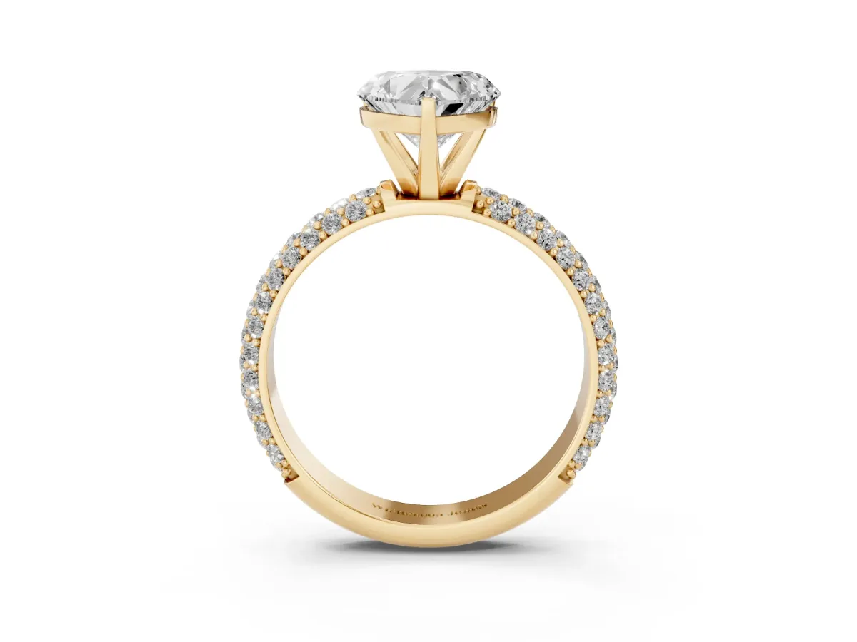 Heart Cut Diamond Solitaire Ring with Prong Setting and Pavé Band Yellow gold