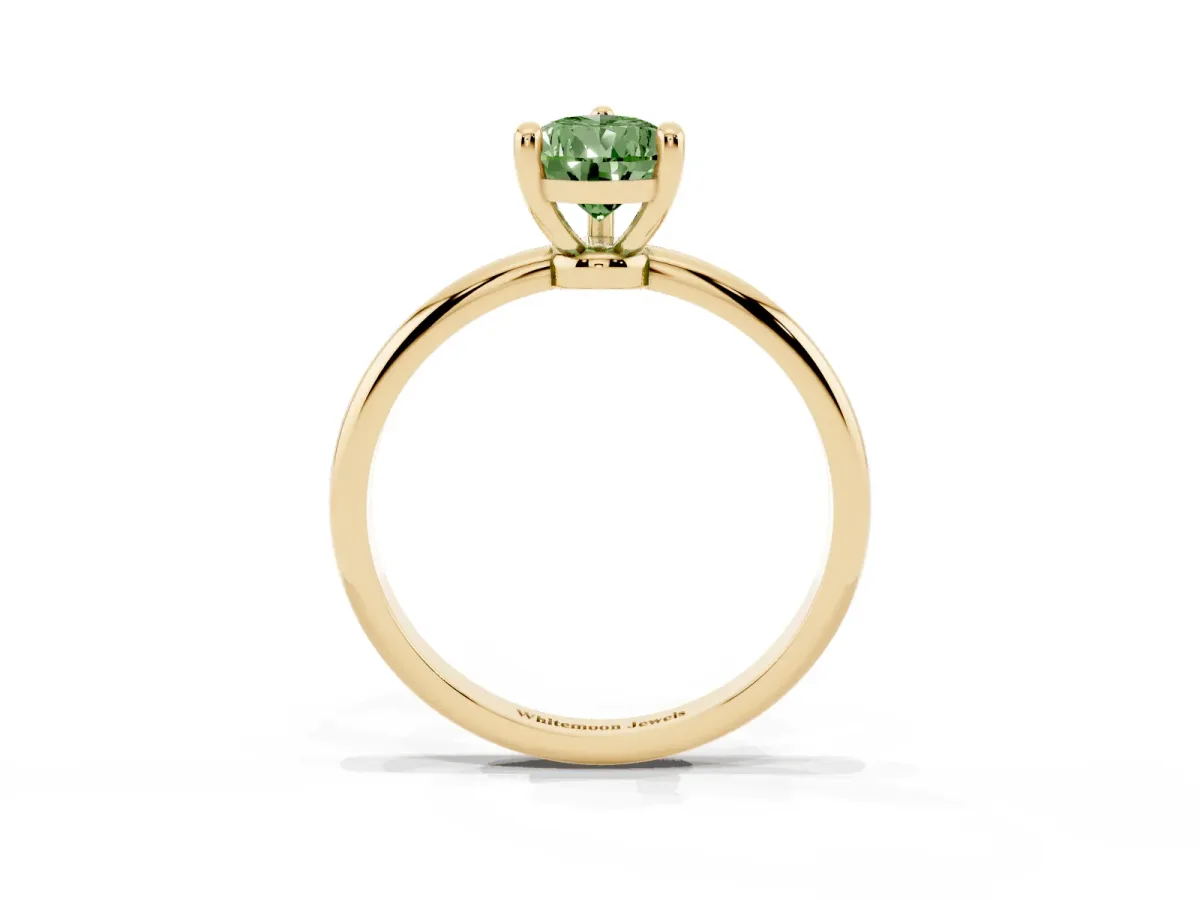 Fancy Green Pear Cut Solitaire Diamond Ring with 4-Prong Setting on a Classic Band Yellow gold