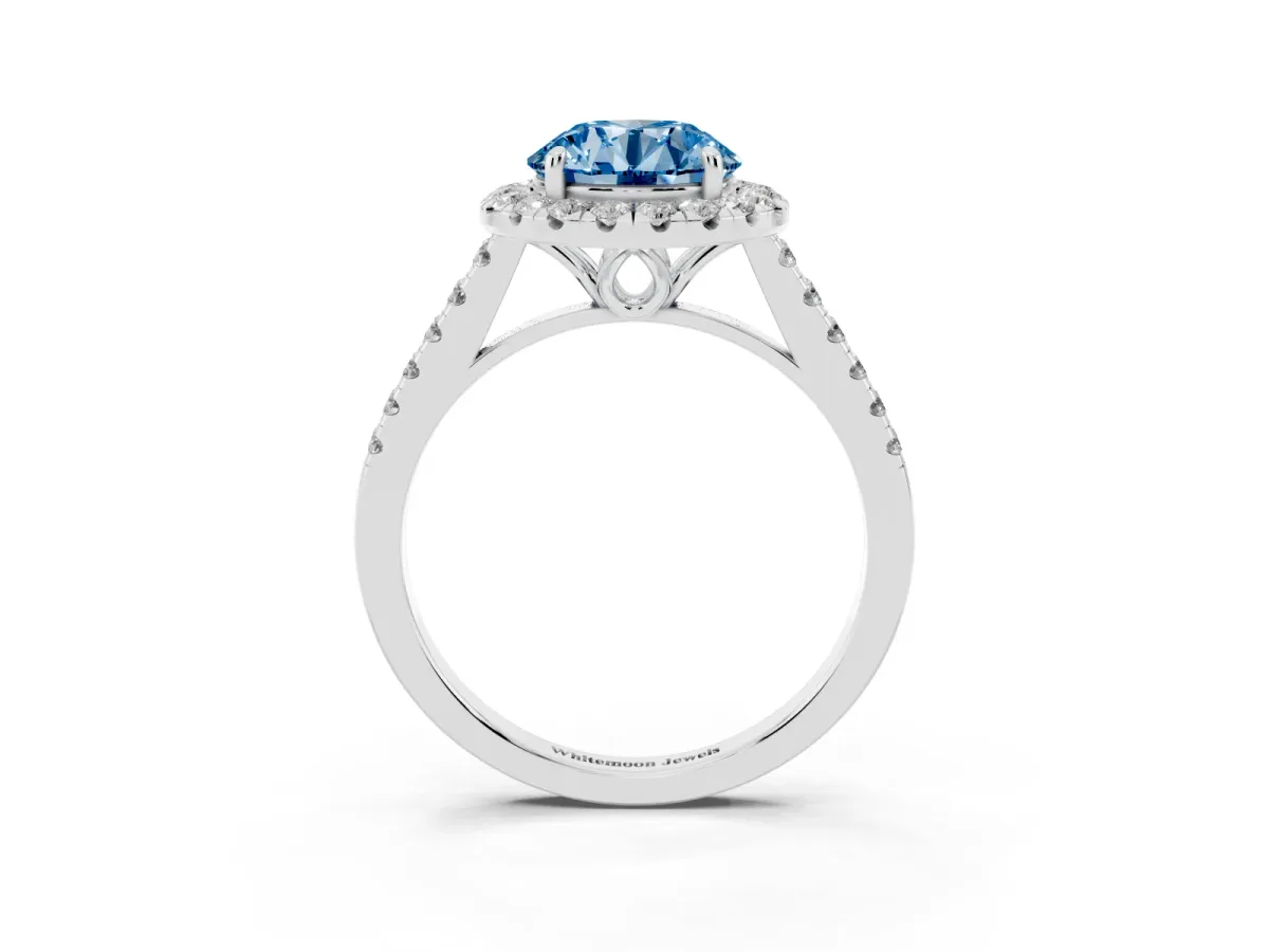 Fancy Blue Round Cut Halo Pavé Diamond Engagement Ring with Four-Prong Setting Silver
